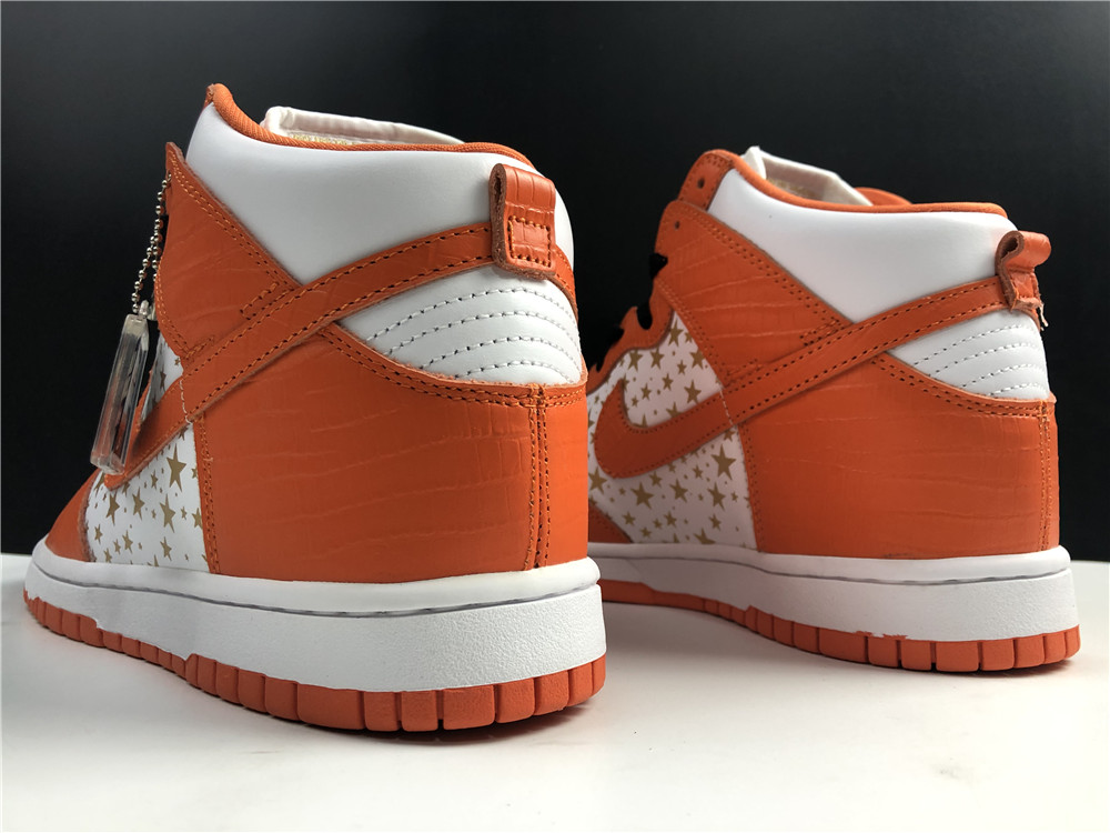 from Supreme x Nike SB Dunk High”Stars Orange”