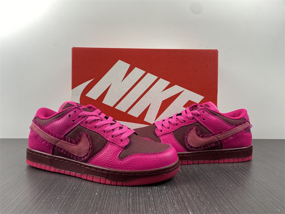 from Nike Spruces Up Its Dunk Low Team Red/Pink DQ9324-600