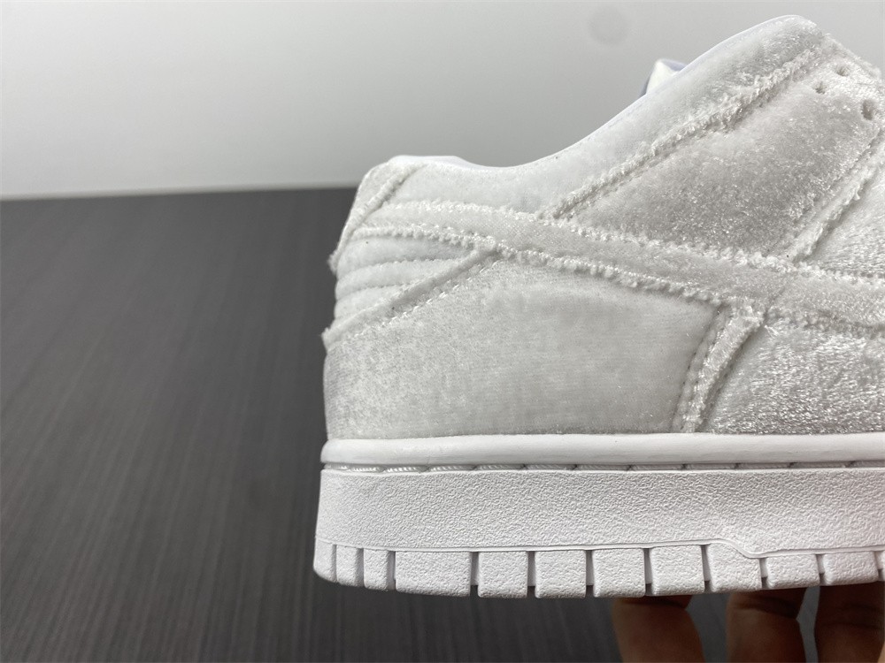 from Dover Street Market x Nike Dunk Low “Triple White” DH2686-100