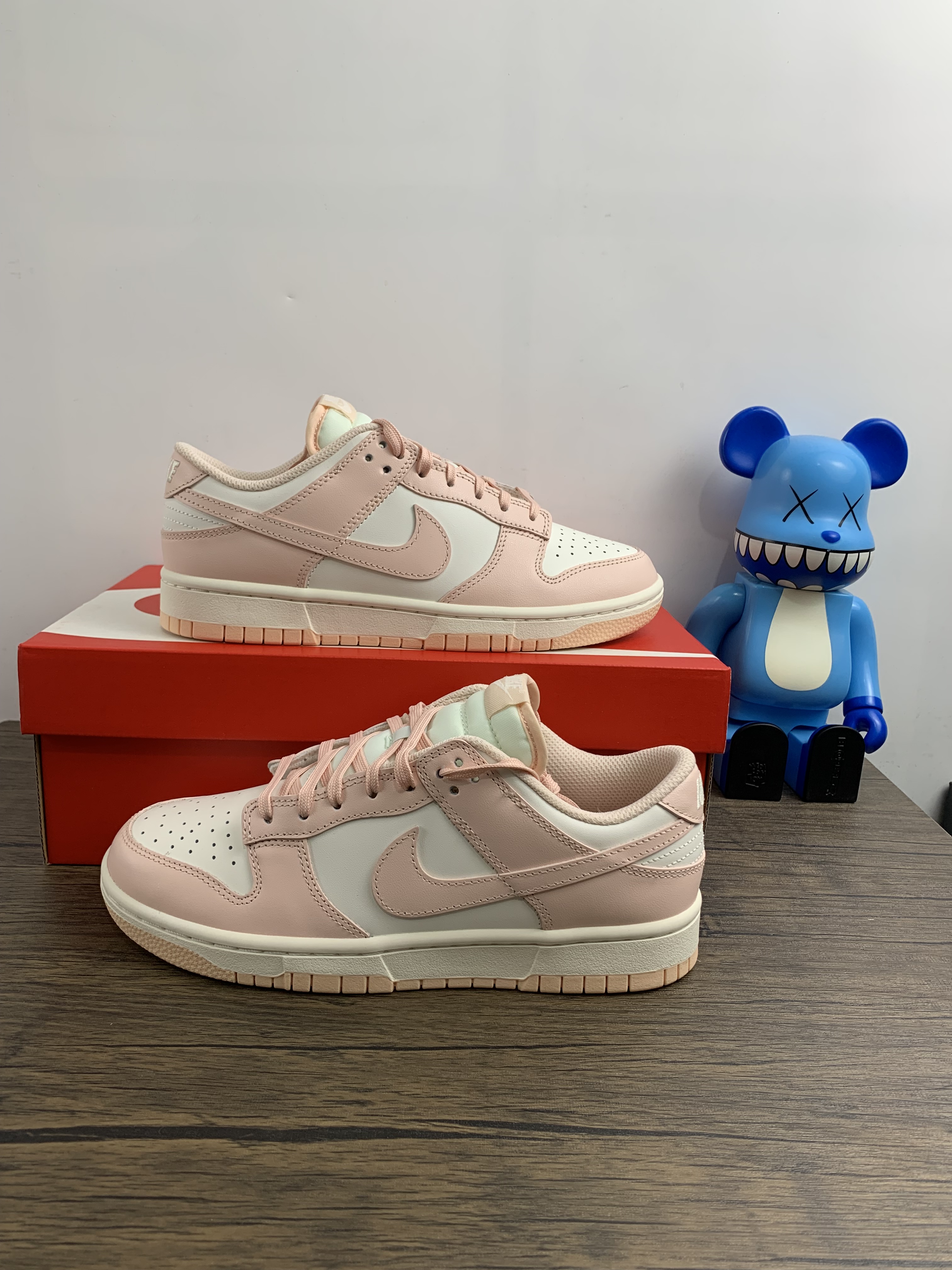 from Nike Dunk Low WMNS “Orange Pearl”